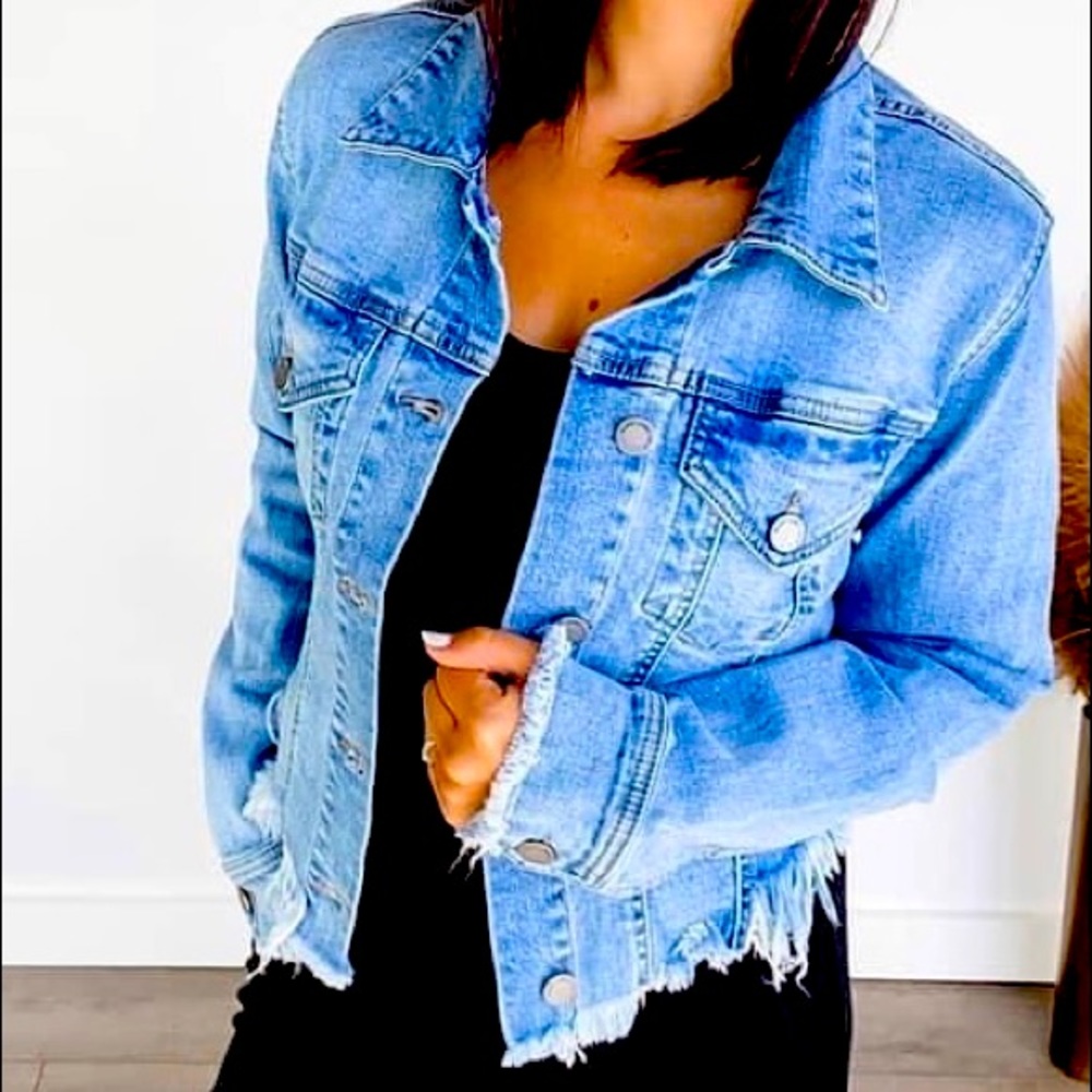Distressed jean jacket